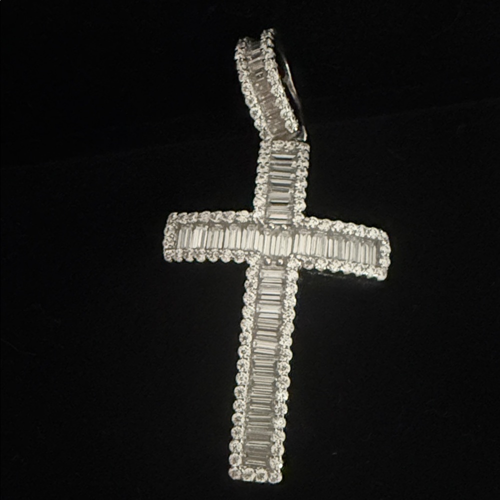 Sparkling Moisanite Cross Pendant filled with banquettes.. stunning